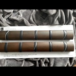 x2 Wall mounted coat rack, 5- retractable hooks each. As seen in picture!